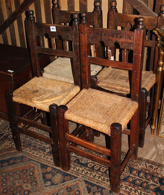 4 carved oak Cathedral chairs(-)